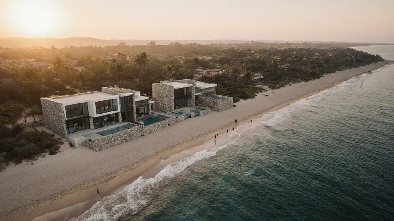 Minimalist beachfront villas at Palmera Beach at sunrise, facing a quiet private shore.
